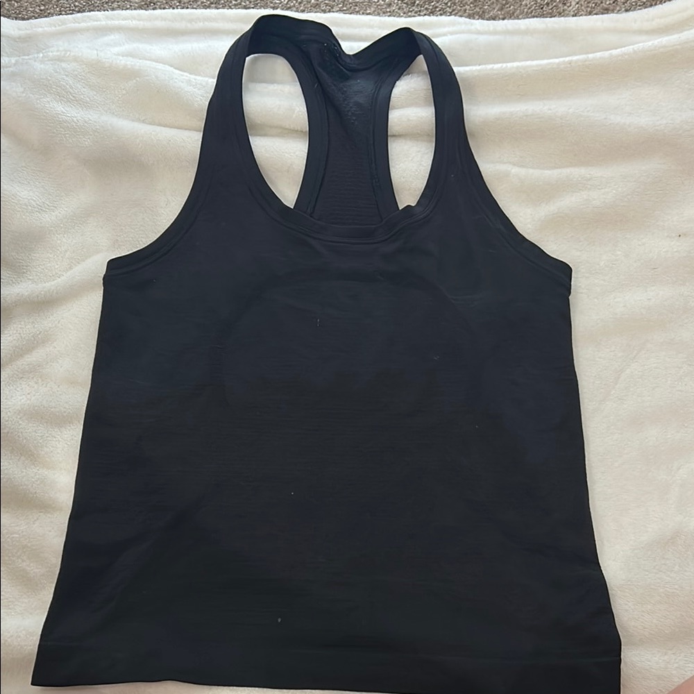 Black Lululemon Racerback Tank Top, size 4, 2 small paint stains